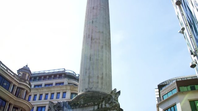 LONDON - MAY, 2017: Monument to the Great Fire of London, Fish St Hill, London, EC3, tilt shot