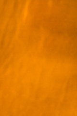 Patterns in shades of orange as a textured background

