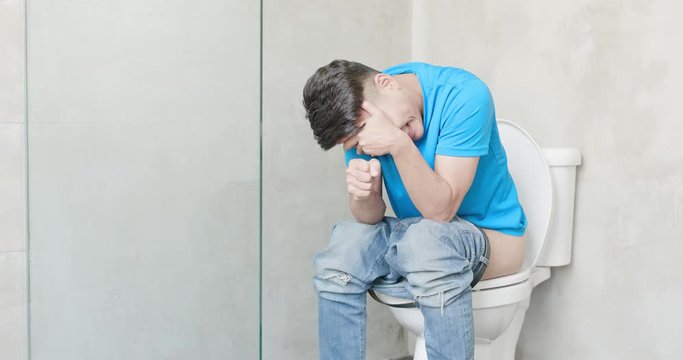 man feel pain with constipation