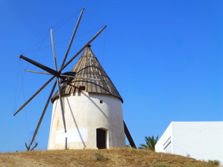 Fototapeta na wymiar Molino de viento de Las Negras, pueblo de pescadores del Parque Natural de Cabo de Gata en Almeria (Andalucia,España).