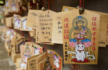 Obraz premium Traditional votive ema tablets at Goutokuji Shrine, Tokyo, Japan