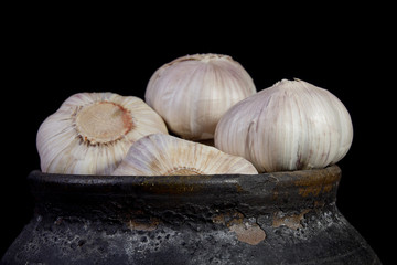 Garlic in a clay pot