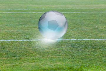 Crystal ball on the football field with soccer ball