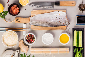 sushi ingredients on a grey concrete background © Natalia Klenova
