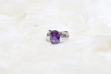 diamond ring and purple gemstone