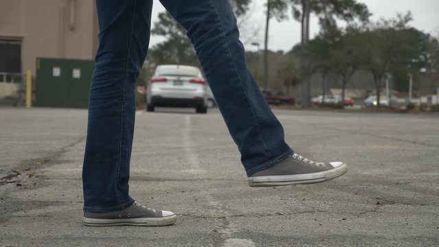 A drunk person tries to pass a DUI test during a traffic stop with a police officer.
