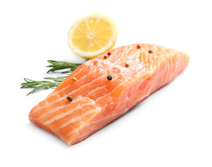 Fresh salmon with rosemary and lemon on white background