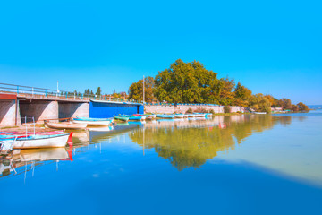 Obraz premium Uluabat lake with boats and trees - Golyazi, Bursa