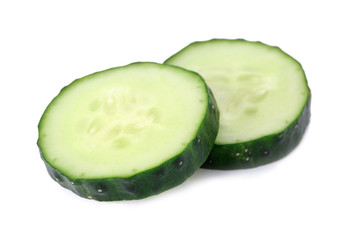 Slices of fresh cucumber on white background