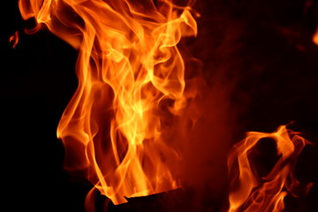 Fire with smoke on black background