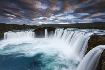 Godafoss waterfall. / Beautiful nature water landscape in volcanic Iceland