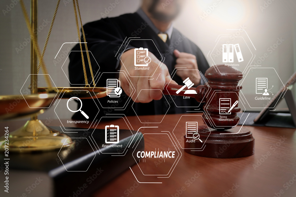 Aufkleber justice and law concept.male judge in a courtroom with the gavel,working with smart phone and digita