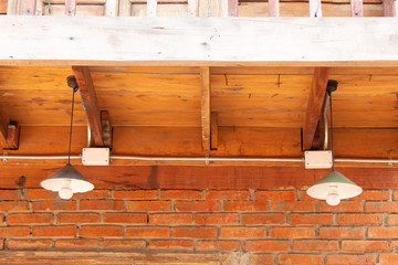 Light on the old brick and wood walls.