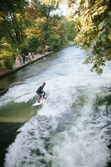Surfing on the Eisbach River, Munich