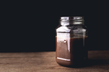 Black coffee in glass In low light Window light