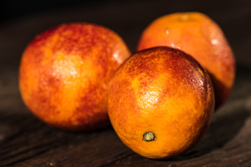 Fototapeta na wymiar Whole ripe juicy Sicilian Blood oranges
