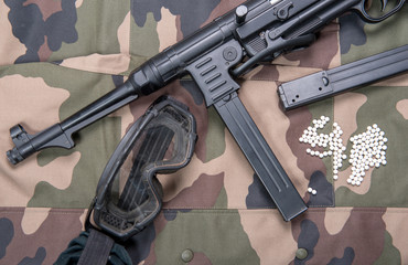 air soft gun with protective glasses and lot of bullets