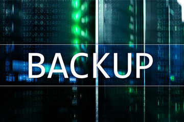 Fototapeta premium Backup button on modern server room background. Data loss prevention. System recovery.&nbsp;