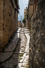 Ancient streets in traditional town Deir el Qamar in vertical position, Lebanon