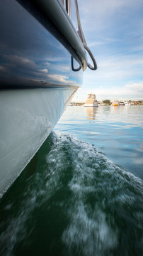 boat duffy ocean water sun blue 