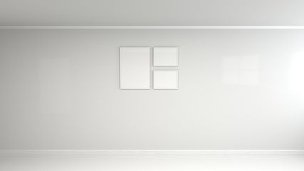 Blank white poster in white frame on the wall