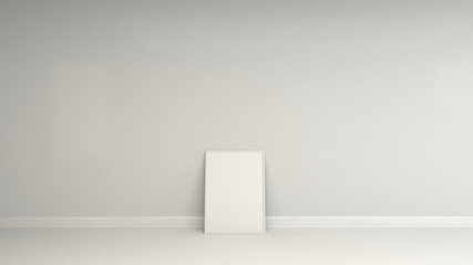 Blank white poster in white frame standing on the floor