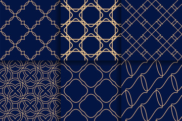 Golden geometric seamless patterns on blue backgrounds