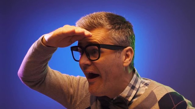 Nerd guy greeting his friends at the disco party