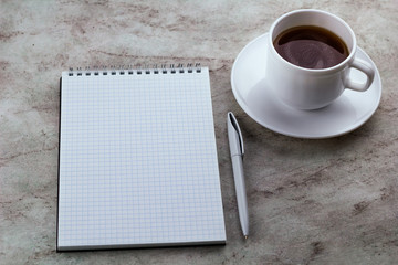 notebook and coffee marble background