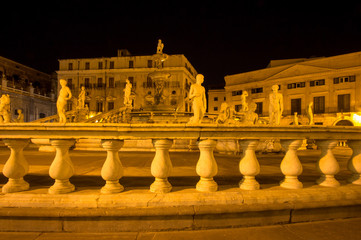 Fountain of shame on  Piazza Pretoria at night, Palermo, Italy