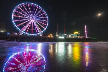 Wandcirkels Pier steel pier with reflection at night,Atlantic city,new jersey,usa.  © checubus