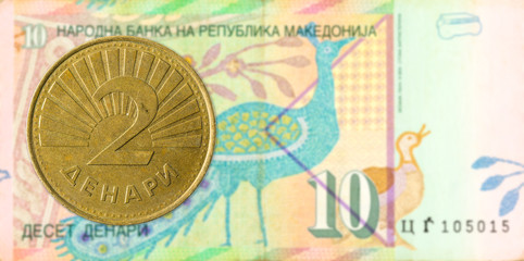2 macedonian denar coin against 10 macedonian denar bank note