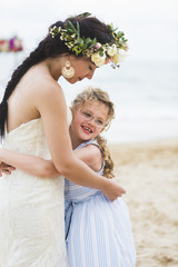 Fototapeta na wymiar Cheerful bride at the beach