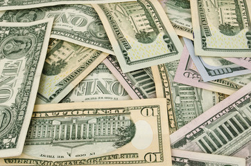 Amarican dollars are scattered with different memorials
