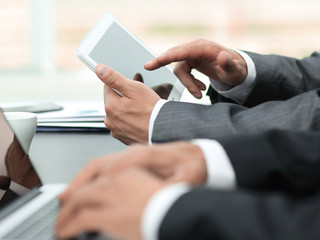 closeup.businessman working on laptop