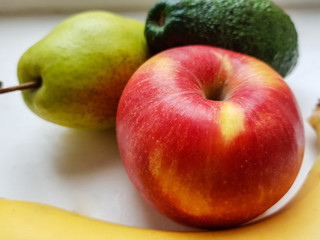 apple, avocado, banana and pear 