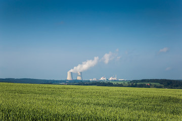 Nuclear power plant near villageTemelin and rye field in Czech Republic. Europe.