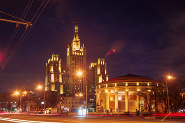 The light trails on the modern building background in Moscow, Russia