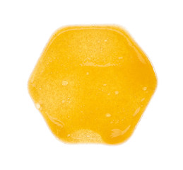 Smear of orange sugar scrub for body and lips