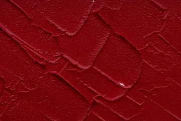 Red matte texture of lip gloss background - obrazy, fototapety, plakaty