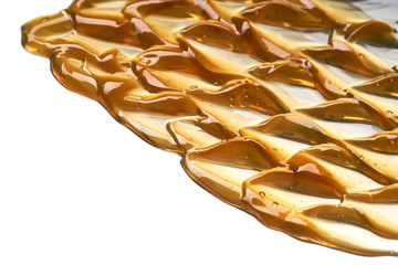 Golden smears of face cream or honey