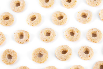 healthy cereal rings on white background. Good morning. A healthy, healthy breakfast. Dry muesli.