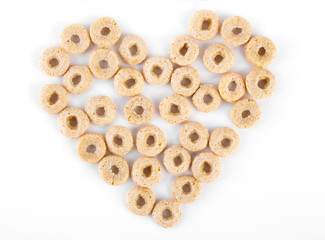 healthy cereal rings on white background. Good morning. A healthy, healthy breakfast. Dry muesli.