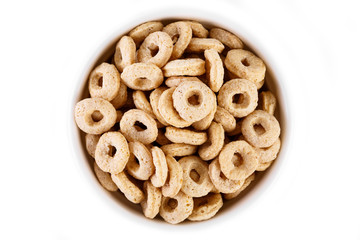 healthy cereal rings on white background. Good morning. A healthy, healthy breakfast. Dry muesli.