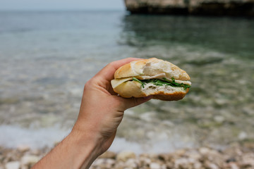 Hamburger it the hand in Polignano a Mare apulia Italy