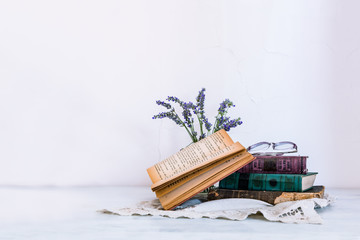 Izmir/Turkey - May 31, 2018: Old books and lavender