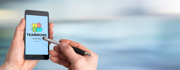 Teamwork concept on a smartphone