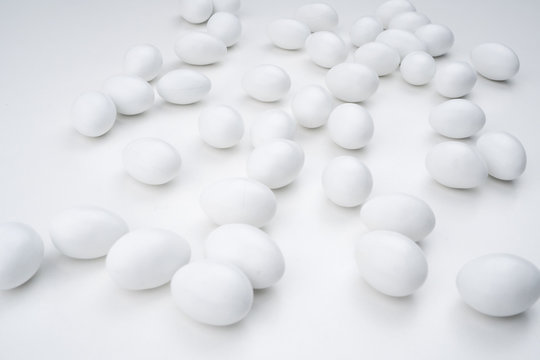 White medical pills isolated on white background