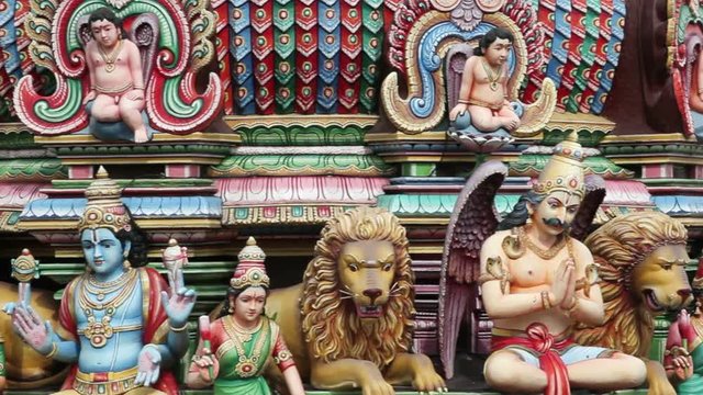 Close up of the Gopuram of the Sri Mariamman Temple in Singapore. A Dravidian style temple in Singapore's Chinatown, Singapore, South East Asia