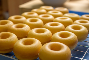 Close-up image of group of baked butter milk donuts